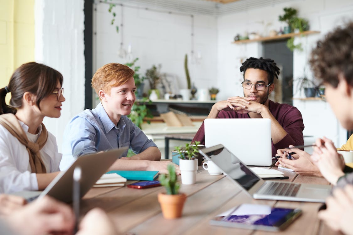 Free Gorup of Employees working Together Stock Photo