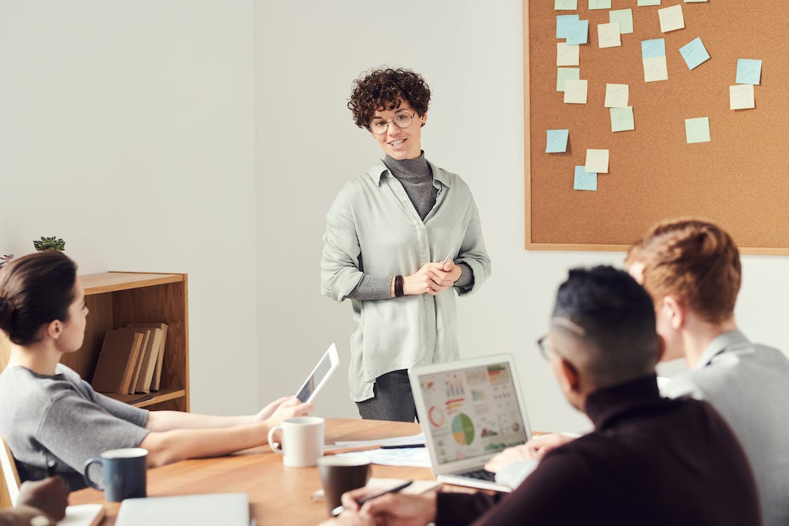 Free Woman Wearing Gray Cardigan and Eyeglasses Stock Photo