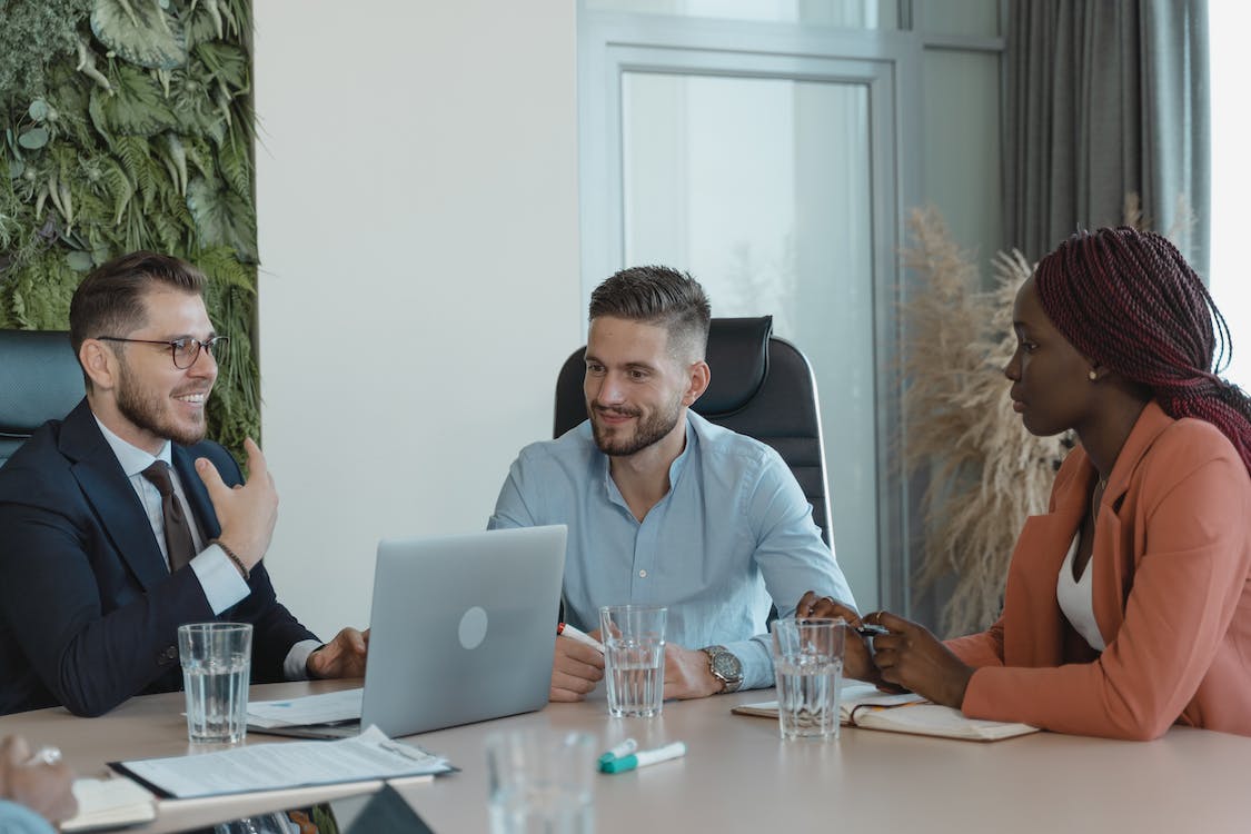 Free Coworkers in a Conference Room having a Meeting Stock Photo